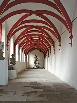 Vaulted gallery in Gothic style.