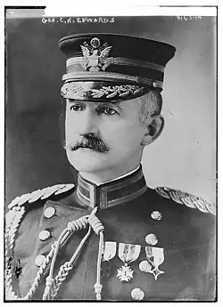 A black and white image showing Edwards in his military uniform with medals.