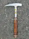 An Estwing geologist's hammer by itself.