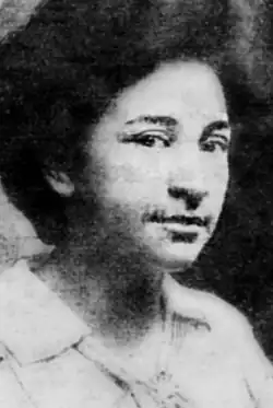 The face of a young African-American woman.