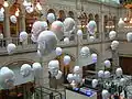 Image 21Floating Heads by Sophie Cave (2006), installed in the East Court of the Kelvingrove Art Gallery and Museum, Glasgow