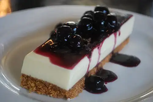 Cheesecake topped with a blueberry sauce
