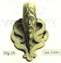 A head at the base of the handle of the Waldalgesheim flagon, Rheinisches Landesmuseum Bonn.: 79