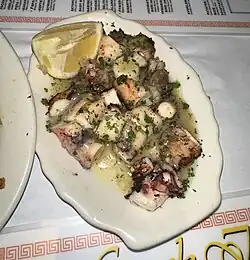 Greek-style grilled octopus with olive oil, lemon, butter and parsley