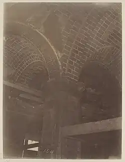 Closeup of completed tile arches and column in entrance hall
