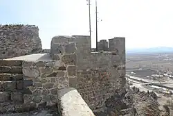 Tower with plain and river in background