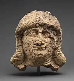 Female head; circa 2000-1600 BC; ceramic; 18 x 12.7&nbsp;cm; Metropolitan Museum of Art (New York City)