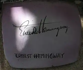 Plate and signature of Ernest Hemingway