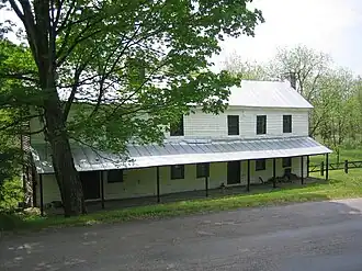 The Hiett Log House along Cold Stream Road (County Route 45/20) in North River Mills