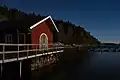 Moonlight illuminates a boat club in Holma, Sweden.