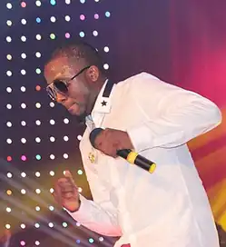 Ice Prince performing at an event in 2014