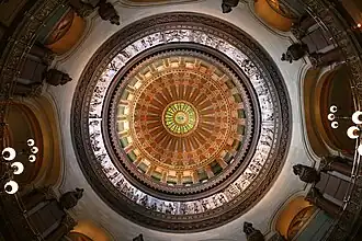 Image 19The dome of the Illinois State Capitol. Designed by architects Cochrane and Garnsey, the dome's interior features a plaster frieze painted to resemble bronze and illustrating scenes from Illinois history. Stained glass windows, including a stained glass replica of the State Seal, appear in the oculus. Ground was first broken for the new capitol on March 11, 1869, and it was completed twenty years later. Photo credit: Daniel Schwen (from Portal:Illinois/Selected picture)