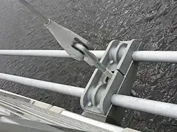 An angled dropper, deck support and bowstring cables