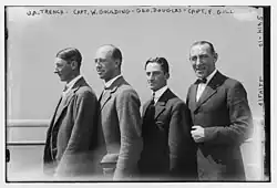 Gill standing in profile together with three of his polo teammates in 1922