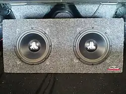 Two 10-inch (250&nbsp;mm) subwoofers in the trunk of a car