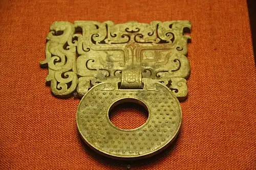 Ancient Chinese volutes and mascaron on an ornamental handle of a bi disc, c.100 BC, jade, Museum of the Mausoleum of the Nanyue King, Guangzhou, Guangdong, China