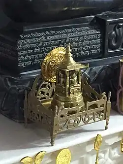 Photograph showing the inscription on a Parshvanath idol