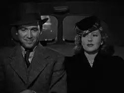 Sen. Jefferson Smith and his aide Clarissa Saunders in a taxi with the Capitol dome lit up at night in the rear window