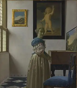 Lady Standing at a Virginal by Johannes Vermeer, in the National Gallery