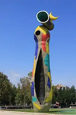 Dona i Ocell, by Joan Miró, 1983, glazed tile mosaic, Barcelona, Spain[79]