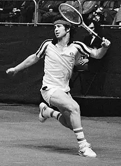 John McEnroe, won the most men's titles (singles & doubles) in the Open Era (155).