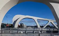 View south across the vehicle and pedestrian lanes of the Johnson Street Bridge.