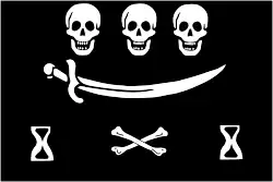 Another flag design by Dulaein, described as “Figures of heads cut off (ie skulls) with a cutlass, piles of bones and hourglasses”. Made out of a fabric called “Ras de St. Maur” - a fine fabric either of wool or silk made in the town of St. Maur - Flag measurement: 22&nbsp;ft 9in long, 14&nbsp;ft 9in wide[25]