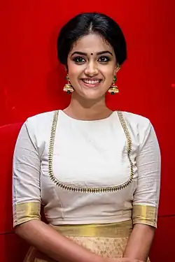 A picture of Keerthy Suresh during success meet of the film Mahanati.