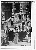 George V and Queen Mary are attended by Pages of Honour in 1911 as they leave St George's Chapel, Windsor Castle