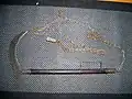 Japanese sickle weapon with a chain and iron weight attached "kusarigama"