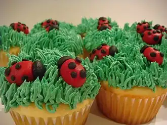 Cupcakes decorated with green buttercream frosting