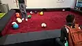 Soccer billiards table, also known as footpool or snookball. The balls are regular soccer balls coloured and numbered to resemble pool balls.