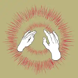 Two human hands making gestures in front of exploding red lights on a brown background.