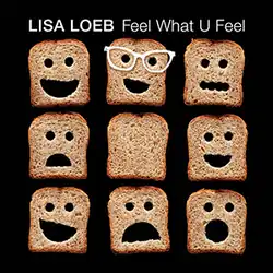 Several pieces of toast with bits cut out to resemble faces