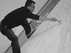 Liu Xiaodong during a performance artwork