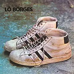 The cover of Lo Borges 1972 album. It is a photograph of a pair of sneakers against a slate blue background.
