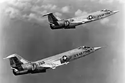 Two F-104s flying in formation