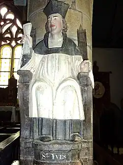 Statue of Saint Yves in the Église Sainte-Geneviève at Loqueffret