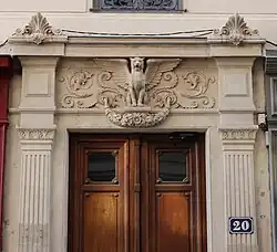 A pair of pilasters flanking a door in Lyon (France)