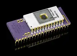 A DIP piggyback microcontroller from MOSTEK with attached DIP socket for an EPROM, both 0.6" wide
