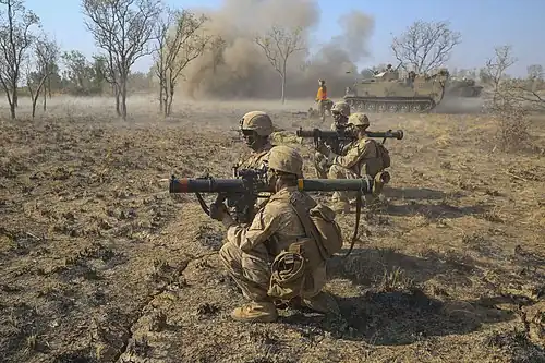 An assault squad preparing to fire their SMAWs