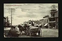 Storefronts along Main Street (later named Whyte Avenue) with a horse and waggon