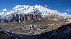 Manang village. Annapurna-III (left, 7,555 m) and Gangapurna (7,455 m) peaks are in the background.