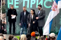 Marinika Tepić, with Radomir Lazović and Miroslav Aleksić around her, at the protest on 30 December 2023