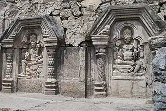 Sculptures in the Martand Temple. The trefoil arch is a characteristic feature of Brahminical temple architecture in Kashmir.[70]