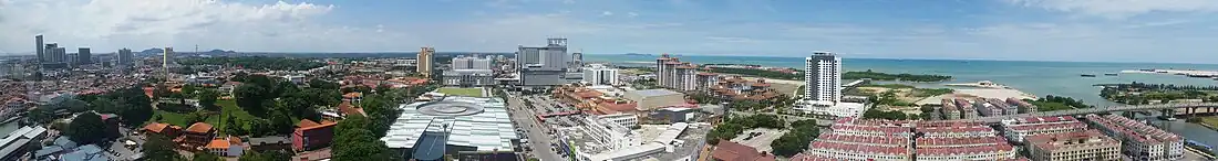 Panorama view of Central Business District or Downtown and Strait of Malacca