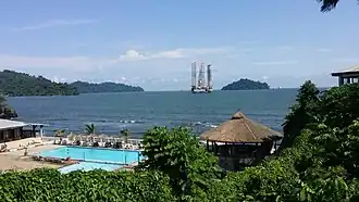 Thatched roof structures at the Limbe Beach