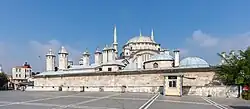 View of the domes and chimneys of the madrasa (right) and imaret (left) on the south side of the mosque