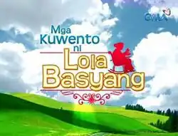 An image of a green field, with a blue sky and clouds on the background. The series title is displayed on the center of the image. The logo of GMA Network is displayed on the upper right side of the image.