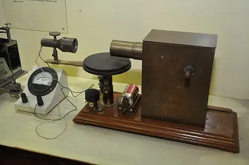 Jagadish Chandra Bose in 1894 was the first person to produce millimeter waves; his spark oscillator (in box, right) generated 60&nbsp;GHz (5&nbsp;mm) waves using 3&nbsp;mm metal ball resonators.